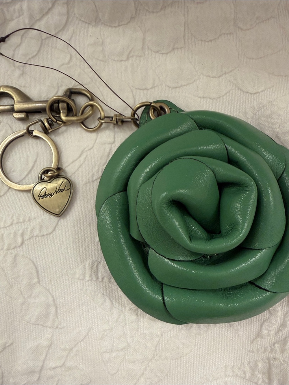 Patricia Nash bag charm with slide out mirror